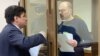 Vladimir Kara-Murza (right) and his lawyer, Vadim Prokhorov, are seen attending a pretrial hearing at the Moscow City Court on March 6.