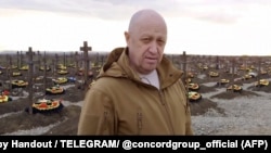 Yevgeny Prigozhin stands at a cemetery for fallen Wagner mercenaries in the settlement of Goryachiy Klyuch in the southern Russian Krasnodar region in early April.