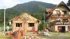 Bosnia and Herzegovina -- The destroyed houses in Srebrenica after the Bosnian war in the 1990s and recently rebuilt ones (house, demolish, destroy, demolished, infrastructure, restored, restore, renovate, renovated), October 8, 2021.