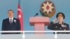 İlham Əliyev və Səfər Əbiyev Azərbaycan Ali Hərbi Məktəbində xüsusi təyinatlı hərbi təhsil müəssisələrinin növbəti buraxılışı mərasimində. 2012