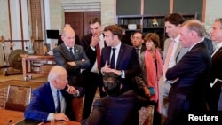 Udhëheqësit e disa prej vendeve më të industrializuara në botë, përfshirë presidentin e SHBA-së, Joe Biden, në margjina të një samiti në Bali të Indonezisë. Nëntor, 2022.