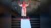 Russian Artist Doused In Fake Blood In Anti-War Protests screen grab