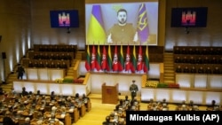 Ukrainian President Volodymyr Zelenskiy speaks via video link to the Lithuanian parliament in Vilnius after winning the 2022 Lithuanian Freedom Prize in January.