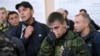 Российские новобранцы собираются в военкомате в Батайске в Ростовской области на юге России 26 сентября. Недавнее украинское контрнаступление выбило российские войска с большей части Харьковской области. Сообщается о больших потерях с российской стороны - солдат и оружия
