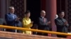 Predsjednik Kazahstana Nursultan Nazarbajev, predsjednica Južne Koreje Park Geun Hje, predsednik Rusije Vladimir Putin i kineski predsjednik Si Đinping aplaudiraju tokom vojne parade povodom 70. godišnjice kraja II svjetskog rata, u Pekingu 3. septembra 2015.