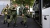 Russian recruits board a bus near a military recruitment center in Krasnodar, Russia, on September 25, 2022.
