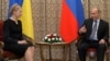 Прем'єр-міністри України і Росії, Юлія Тимошенко і Володимир Путін під час зустрічі в Астані, 22 травня 2009 р.