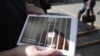 The cards distributed by Tatsyana Ravyaka and Uladzimer Labkovich also contained information about Byalyatski's 2011 trial.