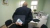 Russia -- corruption, bribe; graft; palm-oil, business, money, 24Sep2007