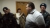 Николай Кавказский идет на одно из судебных заседаний. Апрель 2013 года