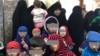 Занону кӯдакони тоҷик дар боздоштгоҳе дар Ироқ
