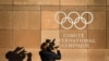 FRANCE -- A television cameraman films the logo of the International Olympic Committee (IOC) at its headquarters in Pully, near Lausanne, prior to an executive meeting on December 5, 2017.