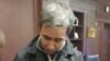 Kazakh businessman Muratkhan Tokmadi after his arrest. Photo from the website of the National Security Committee of Kazakhstan.
