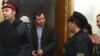 Константина Лебедева выводят из Басманного суда, 18 октября 2012