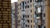 Ілюстративне фото. Пошкоджений внаслідок обстрілів багатоповерховий будинок в Авдіївці. Квітень 2016 року