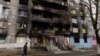 Ілюстративне фото. Пошкоджений внаслідок обстрілів будинок у Шахтарську Донецької області. Грудень 2014 року
