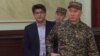 Quandyq Bishimbaev (left) in court in Astana in January