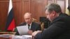 Президент Владимир Путин и министр регионального развития Игорь Слюняев, февраль 2013 года