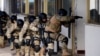 Bosnian State Investigation and Protection Agency agents practice a counterterrorism situation during an exercise at Sarajevo's airport.