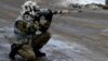 Военнослужащий ВСУ Украины на одном из блокпостов в Донбассе 