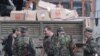 Продолжая операцию по изъятию оружия в Кодорском ущелье, грузинские власти попутно организуют и доставку гуманитарной помощи местному населению