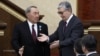 Acting Kazakh President Qasym-Zhomart Toqaev (right) and his predecessor, Nursultan Nazarbaev, attend a joint session of parliament in Astana on March 20.