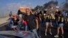 Demonstranti sa transparentima tokom demonstracija koje su organizovale porodice izraelskih talaca u Tel Avivu 26. avgusta 2025. <br><br>Poruka "Gospodine predsjedniče, učinite Bliski istok ponovo velikim" je upućena američkom predsjedniku Donaldu Trumpu.