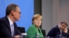Njemačka kancelarka Angela Merkel, premijer bavarske države Markus Soeder i gradonačelnik Berlina Michael Mueller na konferenciji za novinare nakon što su s državnim premijerima razgovarali o produženju zaključavanja zbog COVID-19 , u Berlinu, 23. marta 2021.
