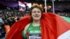 Nadzeya Astapchuk celebrates after winning the women's shot-put final at the London Olympic Games.