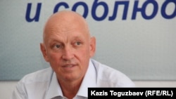 Opposition politician Vladimir Kozlov speaks at a news conference on August 22.