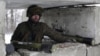 Український військовослужбовець у зоні АТО. Лютий 2015 року. Ілюстраційне фото