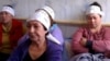 Заемщики по ипотечным кредитам на акции голодовки. Алматы, 21 октября 2013 года.