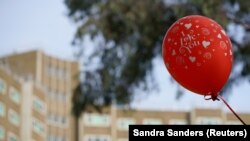 Balon podsjeća na zatvaranje i mjere restrikcije u Melburnu, Australija 10. juli, 2020. 