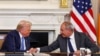 U.S. President Donald Trump shakes hands with Armenia's Prime Minister Nikol Pashinian during a trilateral signing event at the White House, Washington, August 8, 2025. 