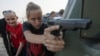 Украинские военные тренируют жителей Мариуполя противостоять сепаратистам, июль 2015 года