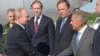 Казань. Министр обороны РФ Сергей Шойгу, президент РФ Владимир Путин, министр промышленности и торговли РФ Денис Мантуров, полномочный представитель президента РФ в Приволжском федеральном округе Игорь Комаров и президент Татарстана Рустам Минниханов (слева направо)