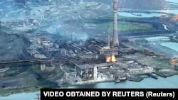 Postrojenje željezare i čeličane Azovstal oštećeno u bombardovanju Mariupolja, Ukrajina, na fotografiji bez datuma iz video-snimka objavljenog 15. maja 2022.