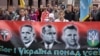 Марш слави Української повстанської армії (УПА). На банері портрети Євгена Коновальця, Степана Бандери та Романа Шухевича (зліва направо). Львів, 14 жовтня 2012 року