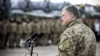 Президент України Петро Порошенко під час передачі військовим частинам ЗСУ озброєння і військової техніки. Житомирська область, 21 грудня 2018 року