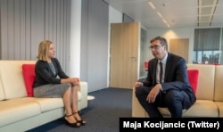 EU foreign policy chief Federica Mogherini (left) speaks with Serbian President Aleksandar Vucic in Brussels on September 7.
