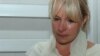 Civil activist Olesya Khalabuzar after she was declared guilty of inciting ethnic hatred by an Almaty court on August 1. 