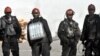 Russia -- Miners take iners rest after making a rescue attempt near the Raspadskayaking coal mine in Mezhdurechensk, 13May2010 