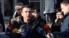 Davor Dragicevic talks to reporters on December 26. 
