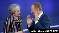Theresa May i Donald Tusk