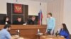 Антон Гученко дар додгоҳ. Акс аз сомонаи "В курсе"
