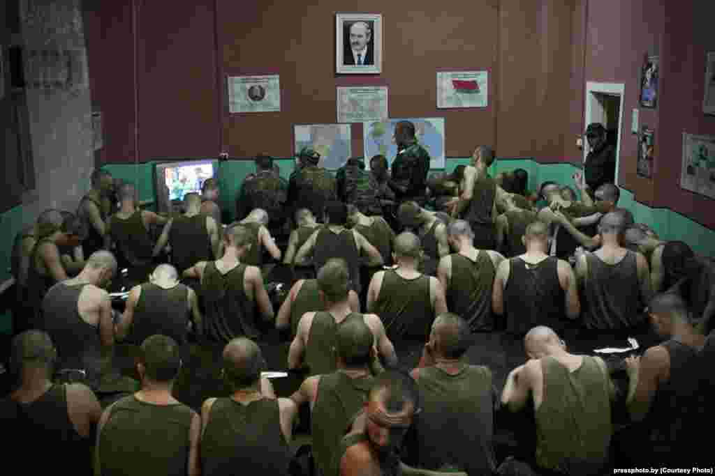 Conscripts in Barysau in the Minsk region participate in the mandatory watching of the news program called &quot;Panorama&quot; on state-run TV. Photo by Syarhey Gudzilin