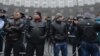 "Титушки" в Киеве. Как считают активисты Евромайдана, именно они совершают большинство жестоких нападений на оппозиционеров