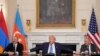U.S. President Donald Trump, joined by Armenian Prime Minister Nikol Pashinian and Azerbaijan President Ilham Aliyev, speaks during a trilateral signing ceremony at the White House, Washington Aug. 8, 2025.
