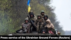 Українські військовослужбовці в зоні бойових дій на Харківщині, 19 квітня 2022 року