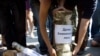 Russia -- Ecologist and Left Front activists bring "Woods of Khimki forest" to the building of Government of Russian Federation, 22Jul2010